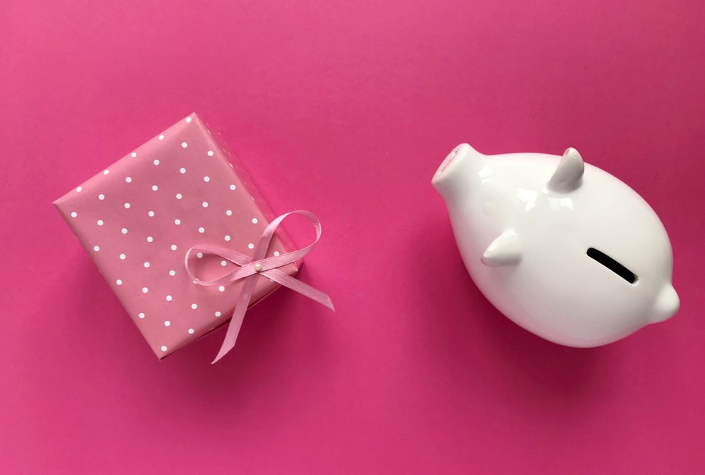 A piggy bank and a pink gift for tax and valentines deadlines