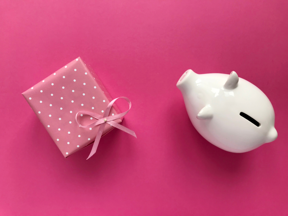 A piggy bank and a pink gift for tax and valentines deadlines