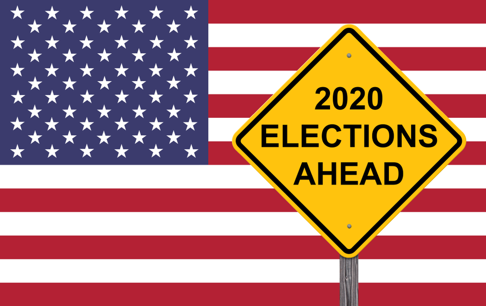 US flag with road warning sign for investor mistakes that says 2020 elections ahead