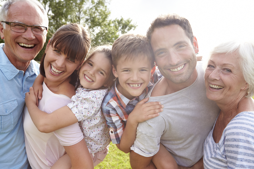 family smiling after figuring out their estate plan